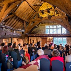 Rustic barn interior at Notley Tythe Barn wedding
