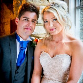Portrait of bride and groom at Notley Tythe Barn wedding