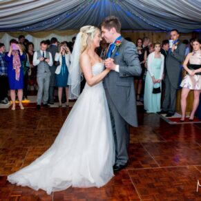 Bride and groom dancing at Notley Tythe Barn wedding