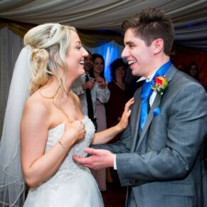 Bride and groom dancing at Notley Tythe Barn wedding