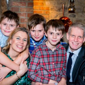 Reportage shot of guests at Notley Tythe Barn wedding