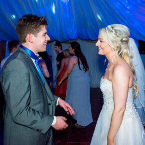 Bride and friend on the danace floor at Notley Tythe Barn wedding