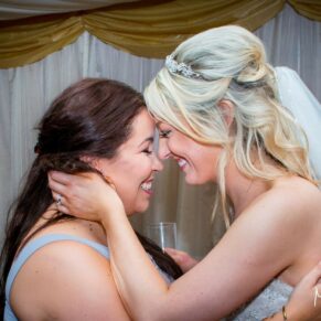 Bride and friend at Notley Tythe Barn wedding