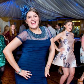Guests enjoying the dancing at Notley Tythe Barn wedding
