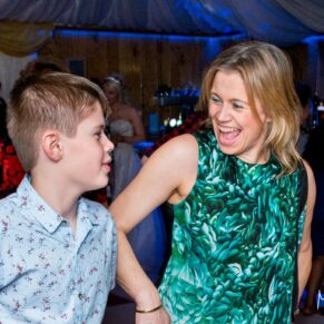 Guests dancing at Notley Tythe Barn wedding