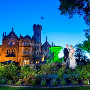 Oakley Court wedding photography of the newlyweds at dusk on the jetty