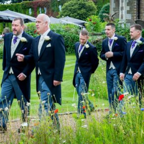 Oakley Court wedding photography of the lads walking through the hotel grounds