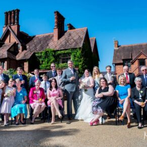 Large group pose at Five Arrows Hotel wedding