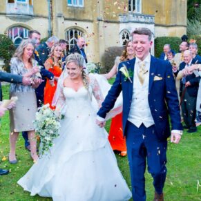 Missenden Abbey autumn wedding confetti aisle