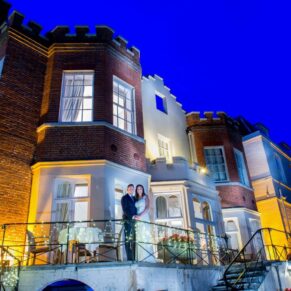 Taplow House summer wedding pose on the terrace at dusk