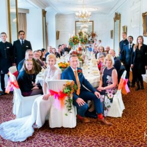 Large group pose at Taplow House autumn wedding
