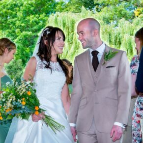 Dairy Waddesdon wedding photographs of the newlyweds leaving the ceremony