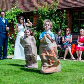 Dairy Waddesdon wedding photographs of the childrens sack race