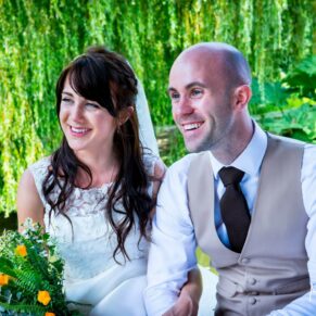 Dairy Waddesdon wedding photographs of the newlyweds with the willow trees