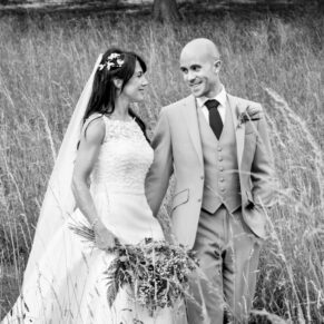 Dairy Waddesdon wedding photographs in the tall grasses at the manor