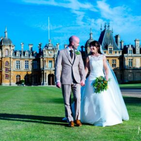 Dairy Waddesdon wedding photographs of the newlyweds taking a stroll on the lawns