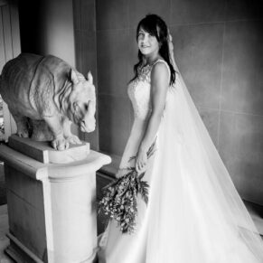 Dairy Waddesdon wedding photographs of the bride by the rhinoceros sculpture
