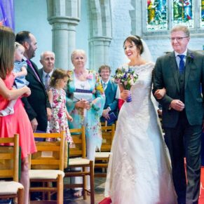 Wedding at St Mary's Church Thame - the bride and her father centering the ceremony