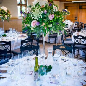 Waddesdon wedding photography of a table centre in the West Hall