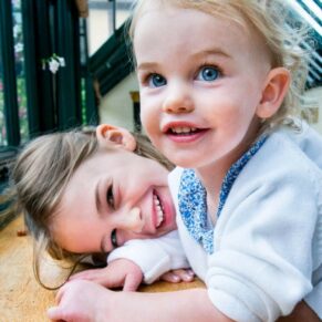 Waddesdon wedding photography of these young wedding guests posing for the camera