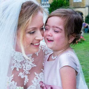 Missenden Abbey wedding shot of the tearful flower girl