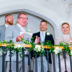 Missenden Abbey wedding shot of the guests enjoying the speeches in the Garden Room