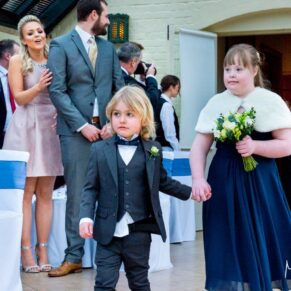 The attendants make their nervous entrance at Dairy Waddesdon Spring wedding