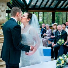 The first kiss at Dairy Waddesdon Spring wedding ceremony