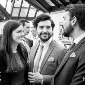 Guests chatting before the ceremony at Dairy Waddesdon Spring wedding