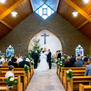 Ceremony in progress at St Josephs Church wedding in Thame