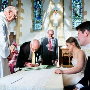 Christmas wedding at St Mary's Church Thame - signing of the register