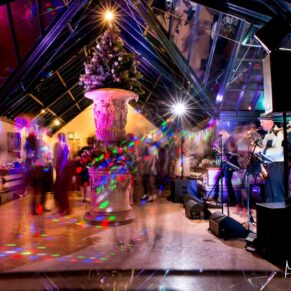 Fabulous dancefloor lighting and atmosphere at Dairy Waddesdon Christmas wedding