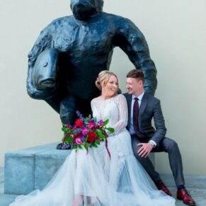 Waddesdon Manor photography shoot of the newlyweds with gorilla statue