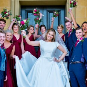 Hedsor House fun wedding photographs in the entrance doorway