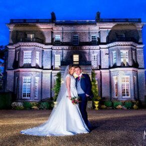 Hedsor House floodlit wedding photographs with the bride and groom