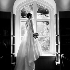 Buckinghamshire black and white wedding photography in the window at Missenden Abbey