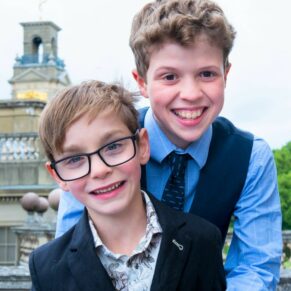 Cliveden House portrait photography of two young lads on the roof terrace