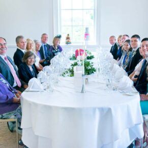 Grove Hotel Watford wedding photography of the guests at the banqueting table