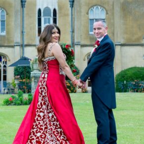 Missenden Abbey wedding blog featuring Alpana & Martin - looking back at the camera