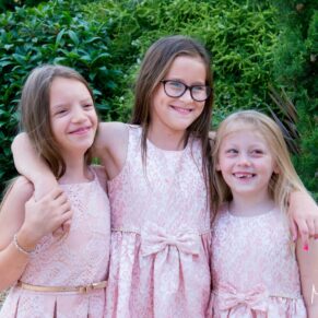 The kids pose for the camera at Notley Tythe Barn wedding
