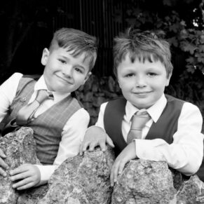 Notley Tythe Barn wedding portrait of two boys captured in black and white