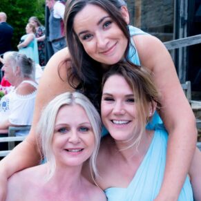 Notley Tythe Barn wedding portrait of the three bridesmaids