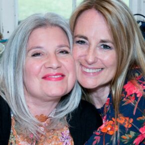 Notley Tythe Barn wedding guests snuggle up for a picture opportunity