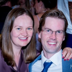 Notley Tythe Barn wedding guests pose for the photographer