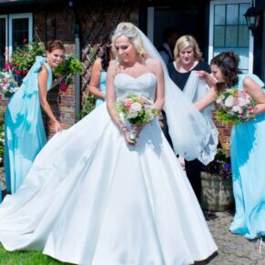 Bride and bridesmaids at Notley Tythe Barn wedding