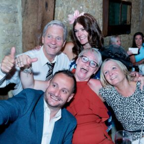 Notley Tythe Barn wedding guests pose for a selfie