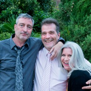 Notley Tythe Barn wedding guests enjoy the warm evening