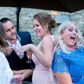 Notley Tythe Barn wedding guests enjoying the celebrations