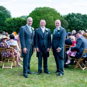 Groom in ceremony at Notley Tythe Barn wedding