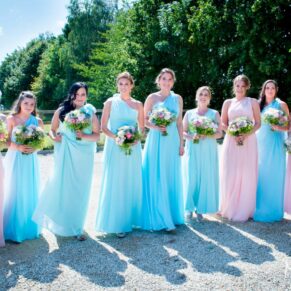 Bridesmaids ready for the ceremony at Notley Tythe Barn wedding